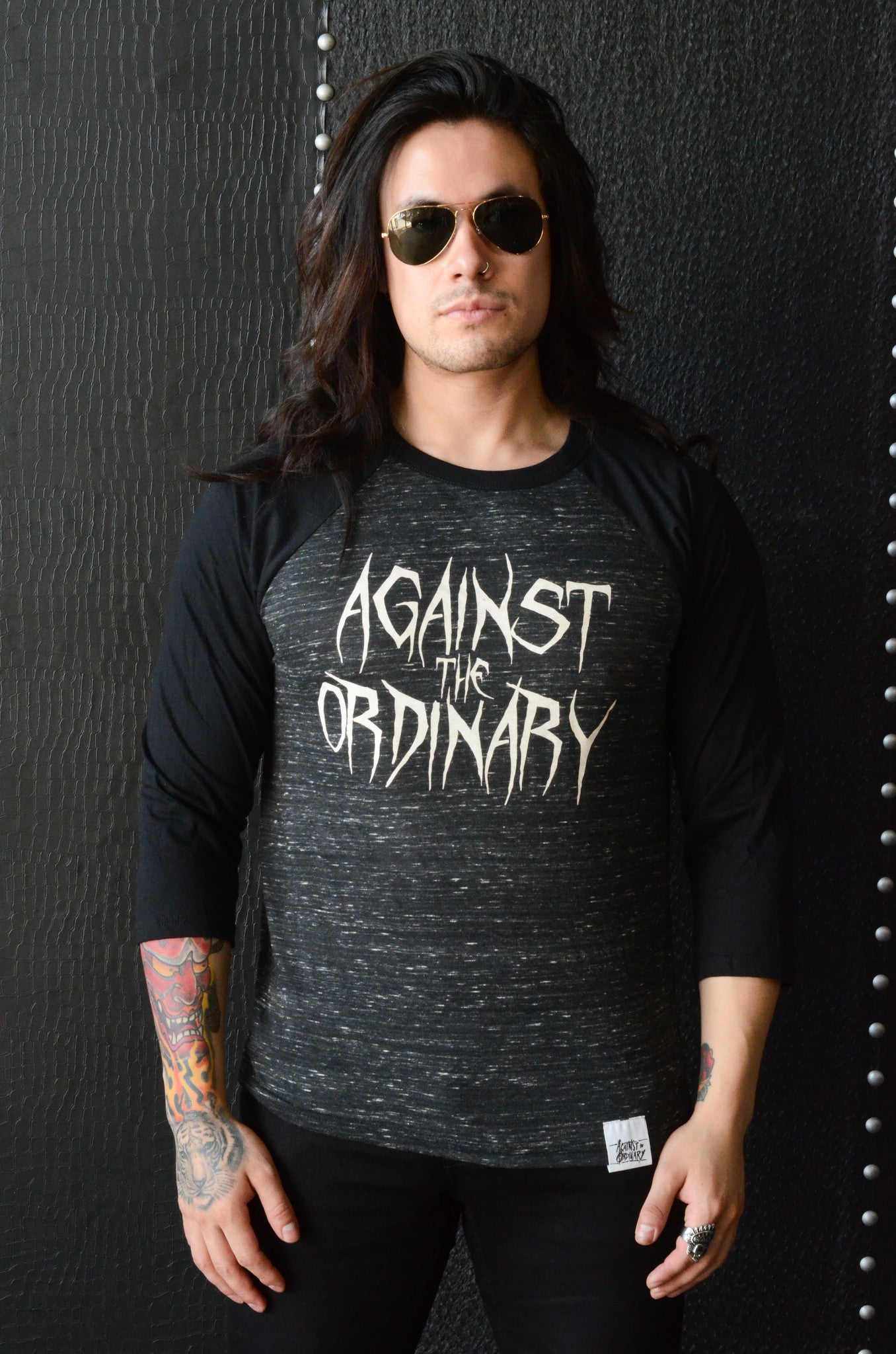Against the Ordinary Unisex Baseball Tee with METAL Design
